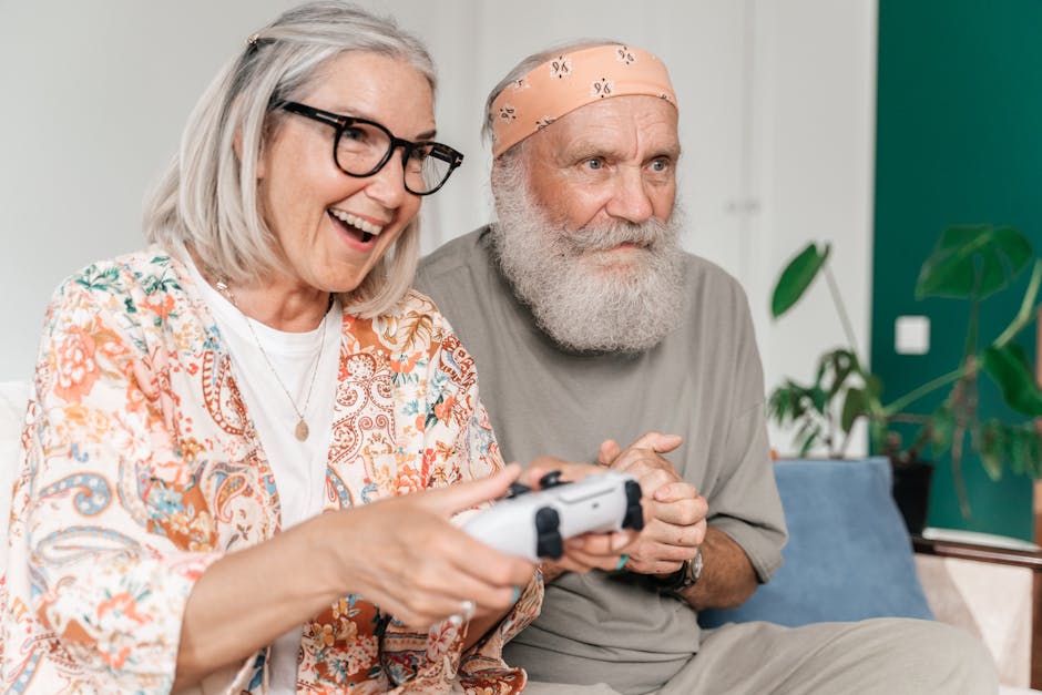Senior couple happily playing video games indoors, promoting active lifestyles.