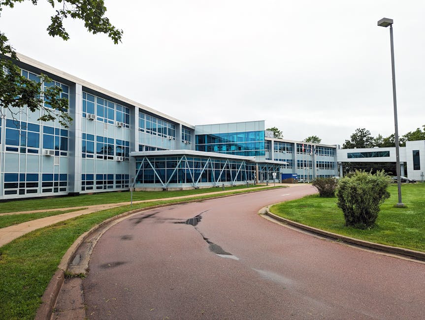 Contemporary university building in Truro, Nova Scotia with sleek glass architecture.